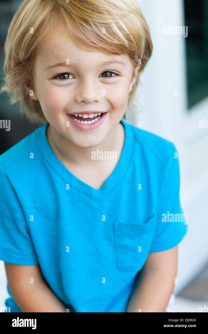 Caucasian boy smiling outdoors Stock Photo