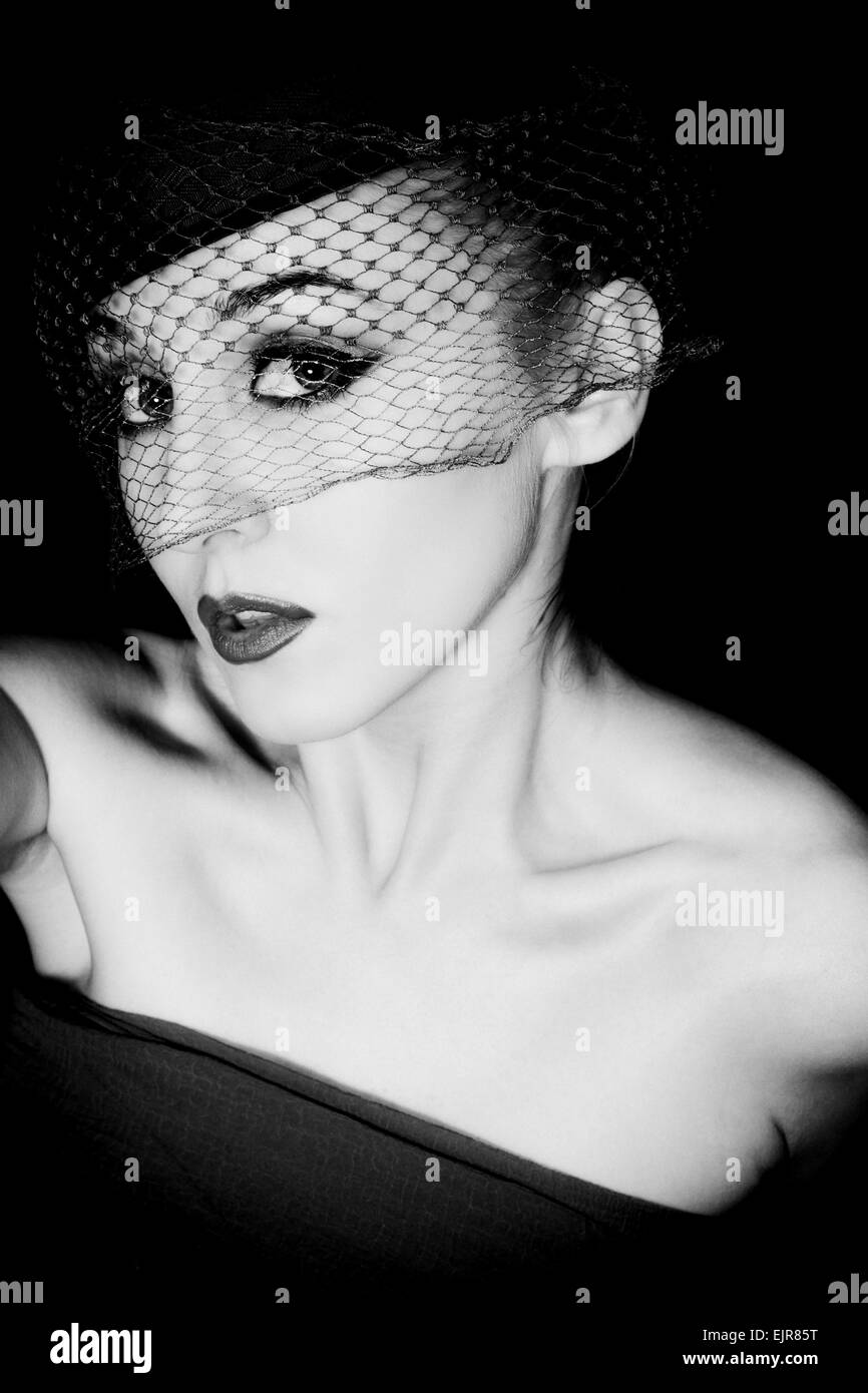 Portrait of beautiful young woman wearing veil and hat. retro Style ...