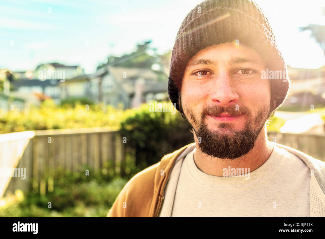 Caucasian man smiling in backyard Stock Photo