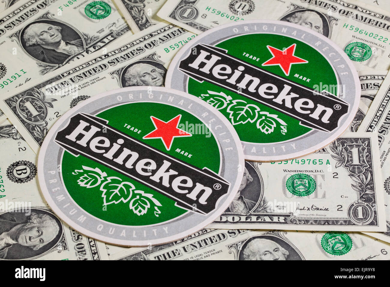 Czech Republic, Brno - January 5,2015: Beermat from Heineken beer and US dollars. Stock Photo