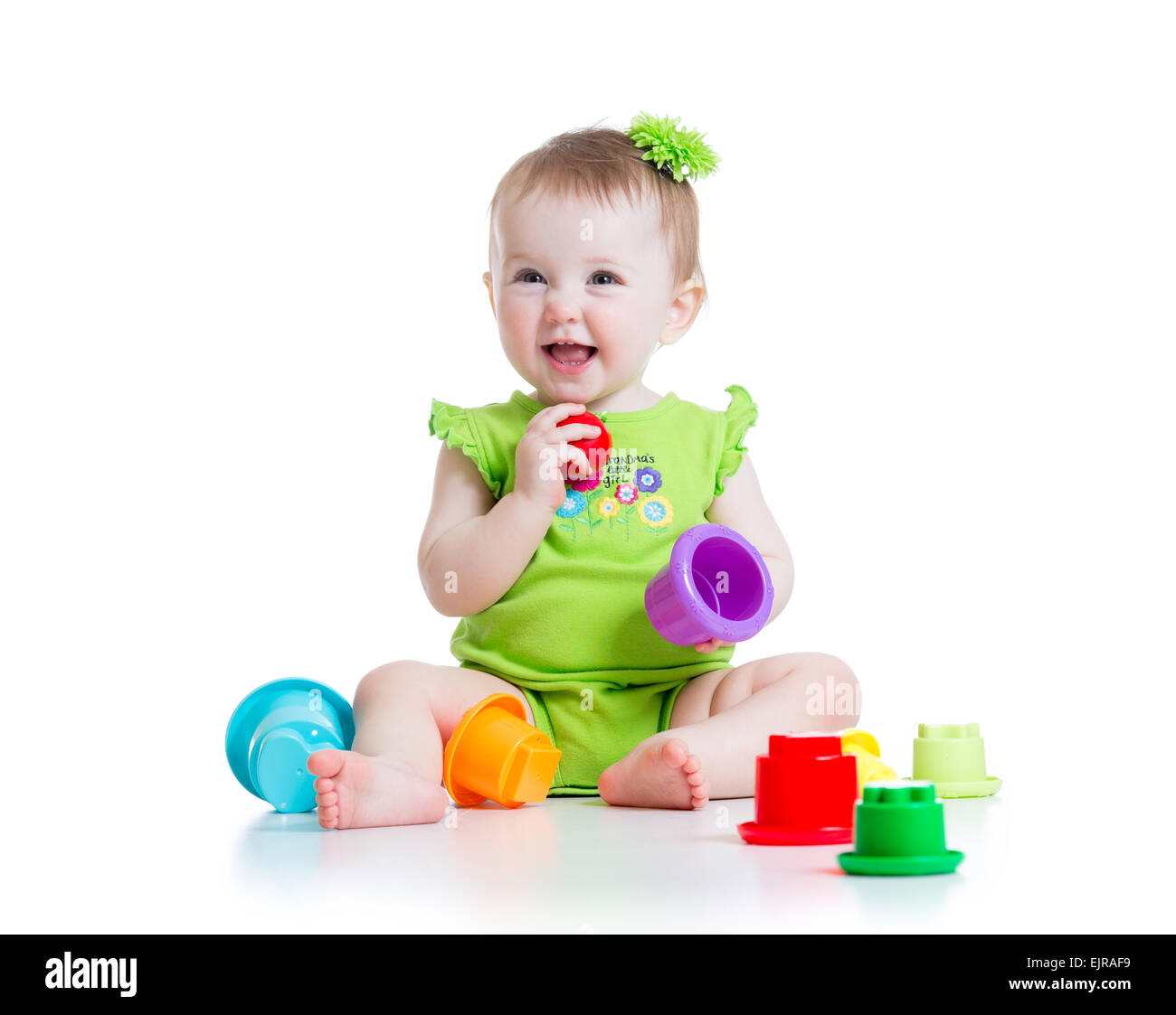 little girl playing with toys Stock Photo - Alamy