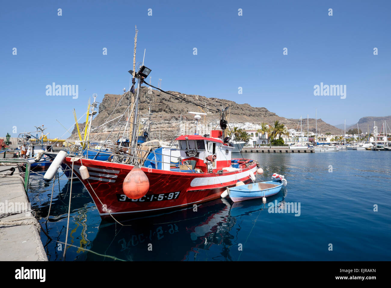 Fishing boats moored in the harbour at Puerto de Mogan, Gran Canaria, Spain Stock Photo