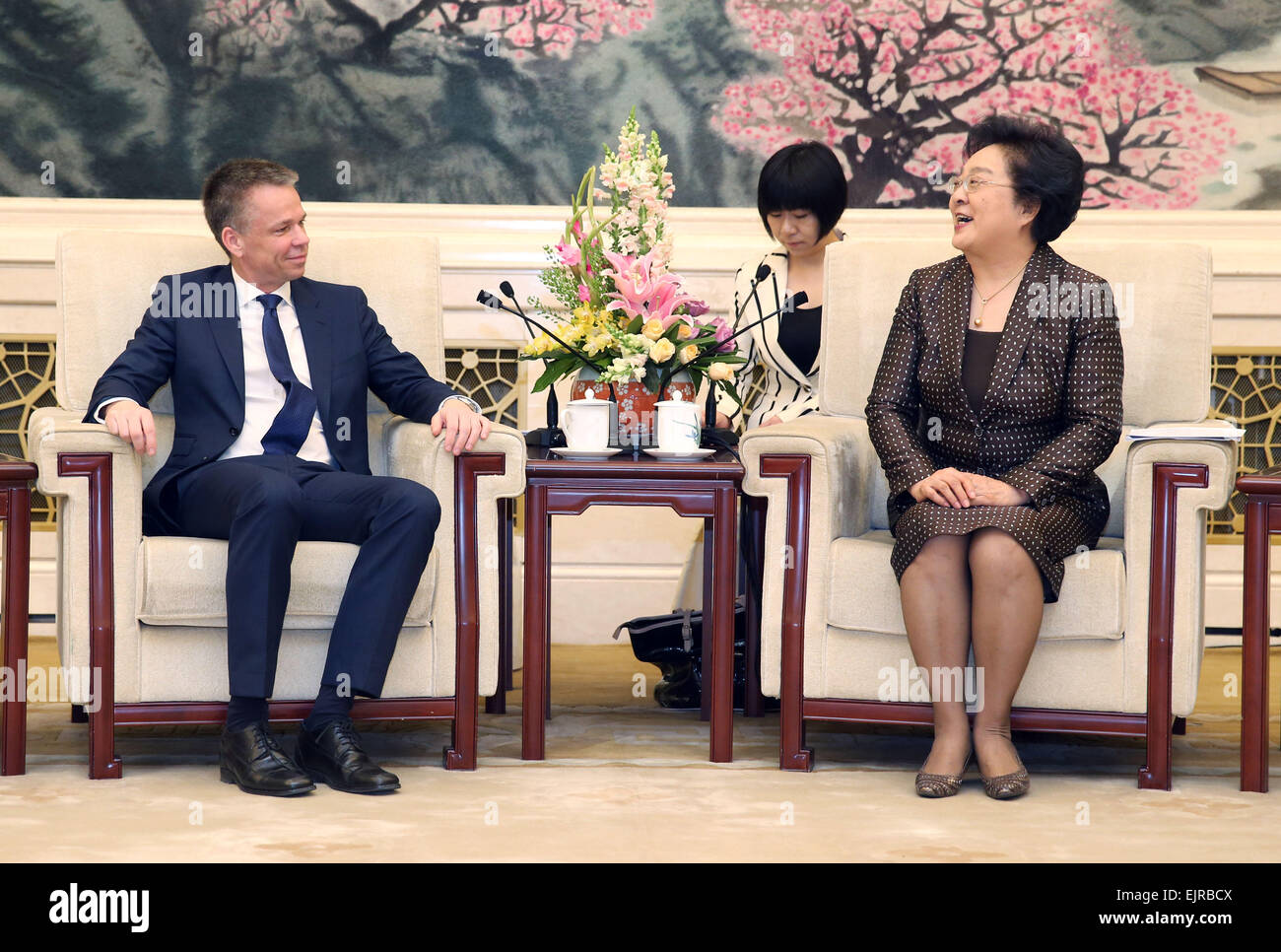 Beijing, China. 30th Mar, 2015. Lin Wenyi (R), vice-chairwoman of the National Committee of the Chinese People's Political Consultative Conference, meets with Harald Himmer, vice president of the Austrian Federal Council, in Beijing, capital of China, March 30, 2015. Credit:  Yao Dawei/Xinhua/Alamy Live News Stock Photo