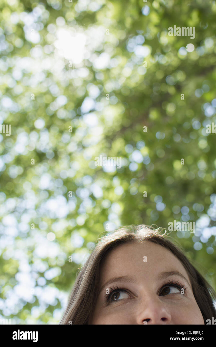 Close up of Caucasian woman looking up Stock Photo