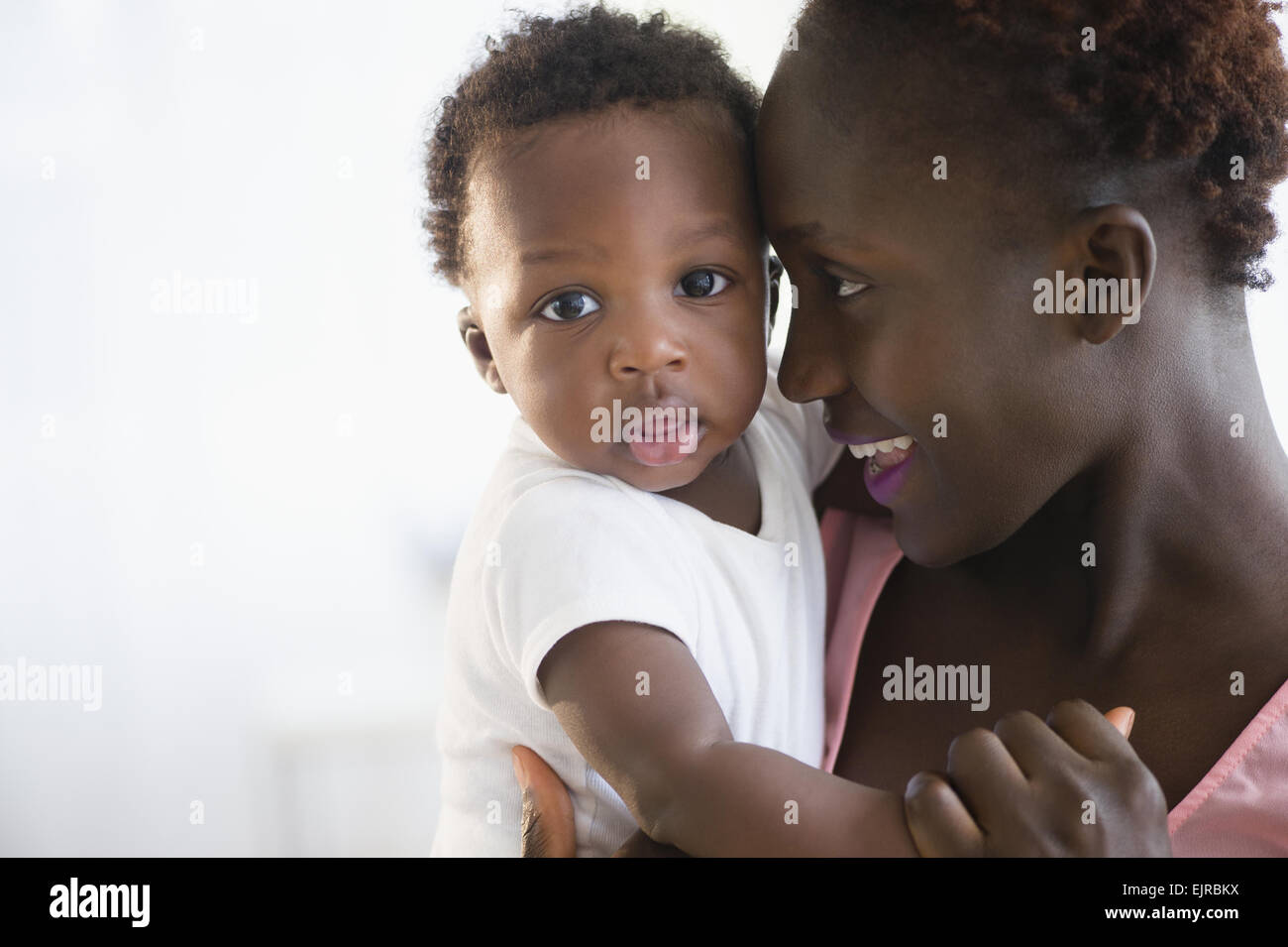Mother and son holding hands hi-res stock photography and images - Alamy