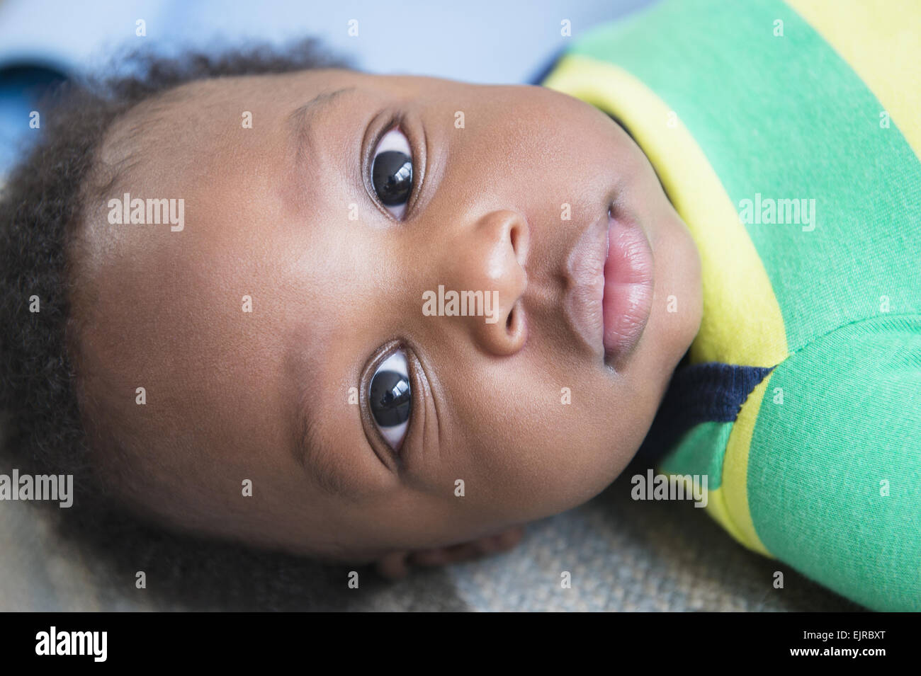 Close up of face of Black baby boy Stock Photo