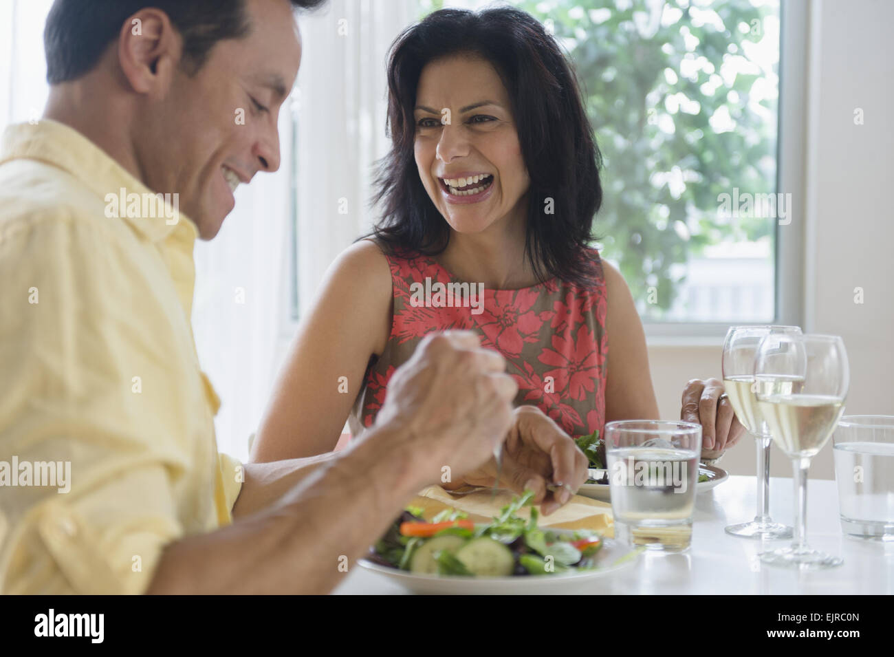 Couple eating lunch in restaurant Stock Photo