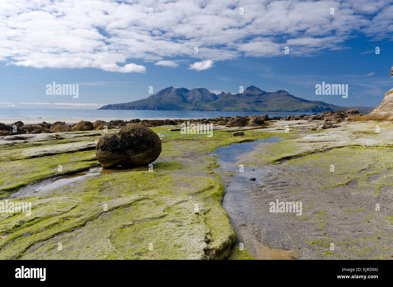 view of isle of rum from laig bay isle of eigg Stock Photo