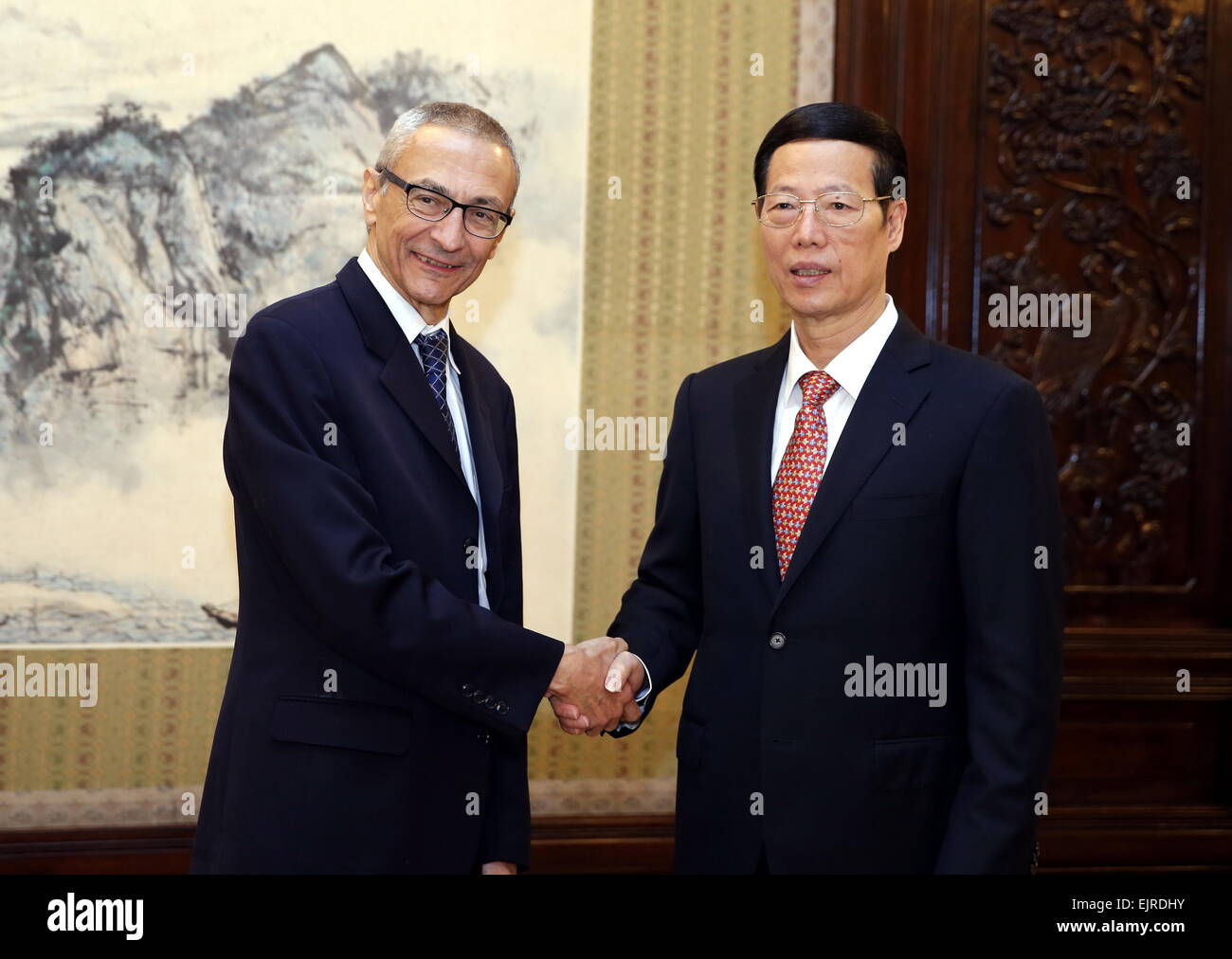 Beijing, China. 31st Mar, 2015. Chinese Vice Premier Zhang Gaoli (R) shakes hands with John Podesta, founder of the Center for American Progress (CAP) of the United States and former chief of staff to then U.S. President Bill Clinton, during their meeting in Beijing, capital of China, March 31, 2015. © Ju Peng/Xinhua/Alamy Live News Stock Photo