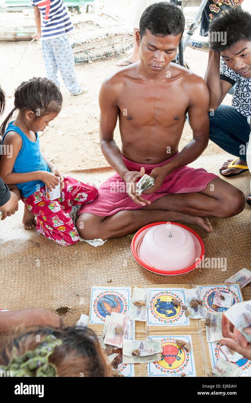 Fisherman village - lifestyle, Kep, Cambodia. People enjoy gambling in the afternoon. Stock Photo