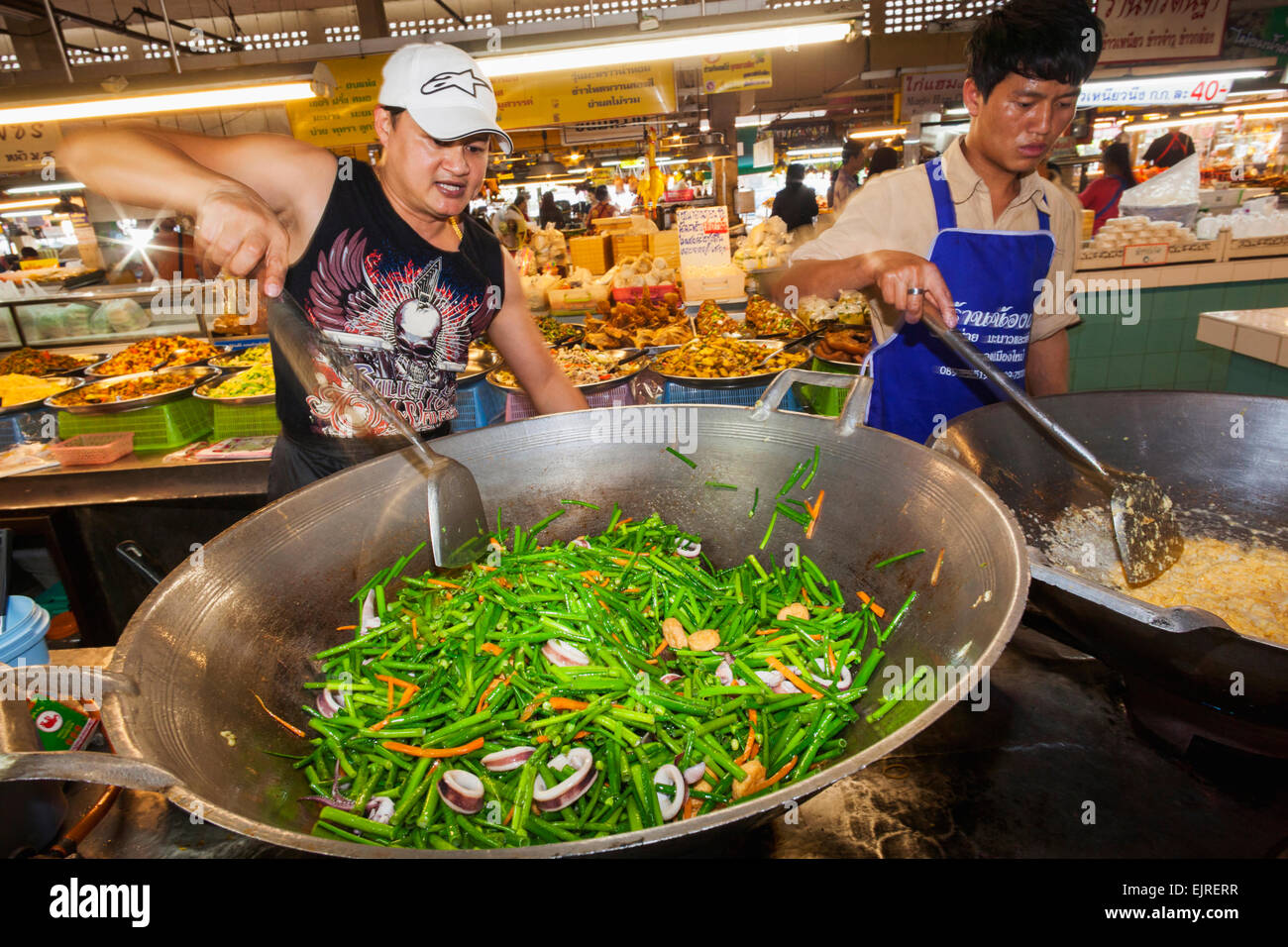 Thailand, Chiang Mai, Warorot Market, Chef Cooking Takeaway Food in Giant  Wok Stock Photo - Alamy