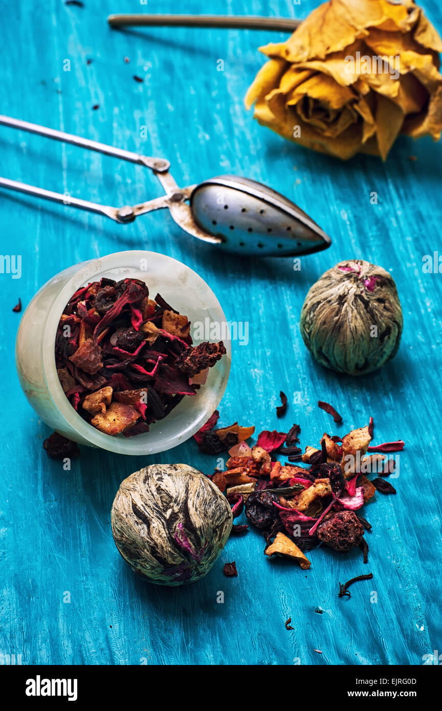 several varieties of dried fragrant tea and custard spoon Stock Photo