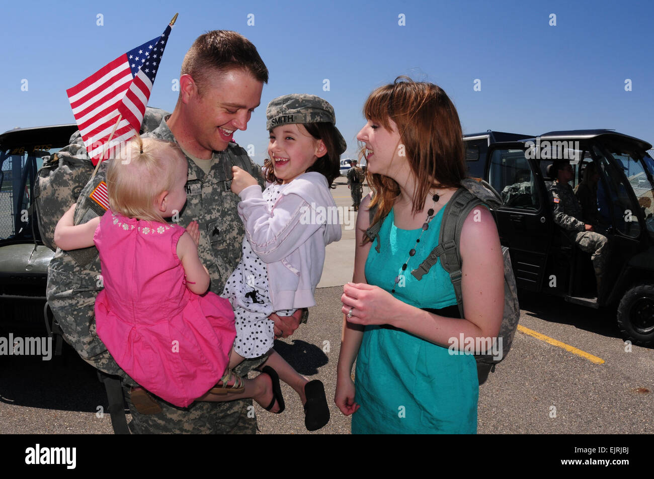 U.S. Army Sgt. Michael Smith is greeted May 14, 2010, at  Hector International Airport in Fargo, N.D., upon returning from a peacekeeping deployment to Kosovo.  Senior Master Sgt. David H. Lipp, Stock Photo
