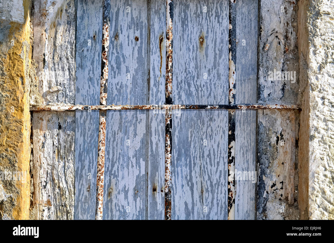 Detail of ruined old window of an old abandoned house Stock Photo