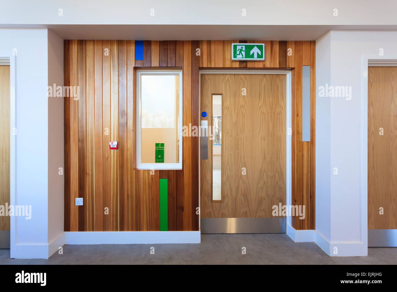 doorway with timberclad surround in modern building without people Stock Photo
