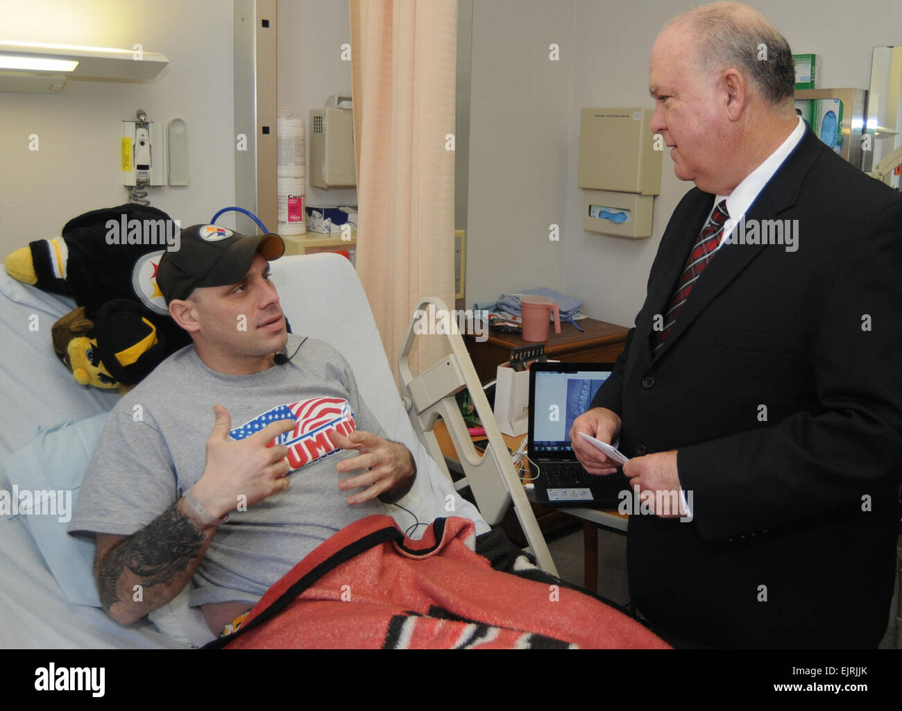 Under Secretary of the Army HON Dr. Joseph W. Westphal meets a Wounded