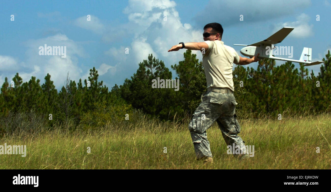 Spc. Jerry Reidy, mortarman, A Troop, 5th Squadron, 73rd Cavalry Regiment launches the Raven during a raven certification training exercise, July 30. The Raven has become an essential tool to provide Paratroopers a proper reconnaissance in a combat environment prior to a mission. Stock Photo