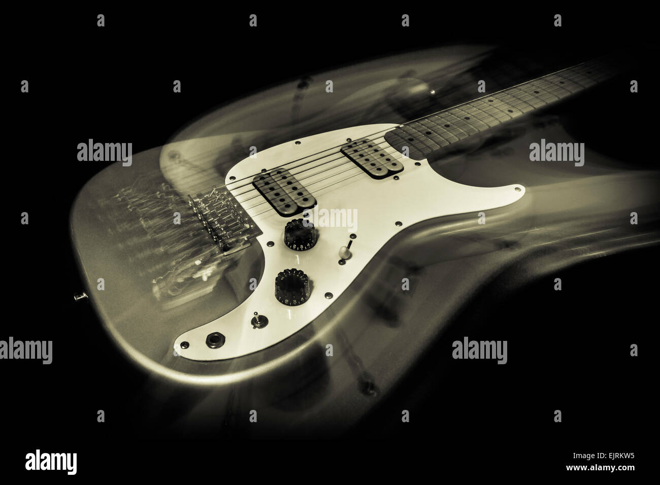 An monochrome electric guitar with a ghost image Stock Photo Alamy