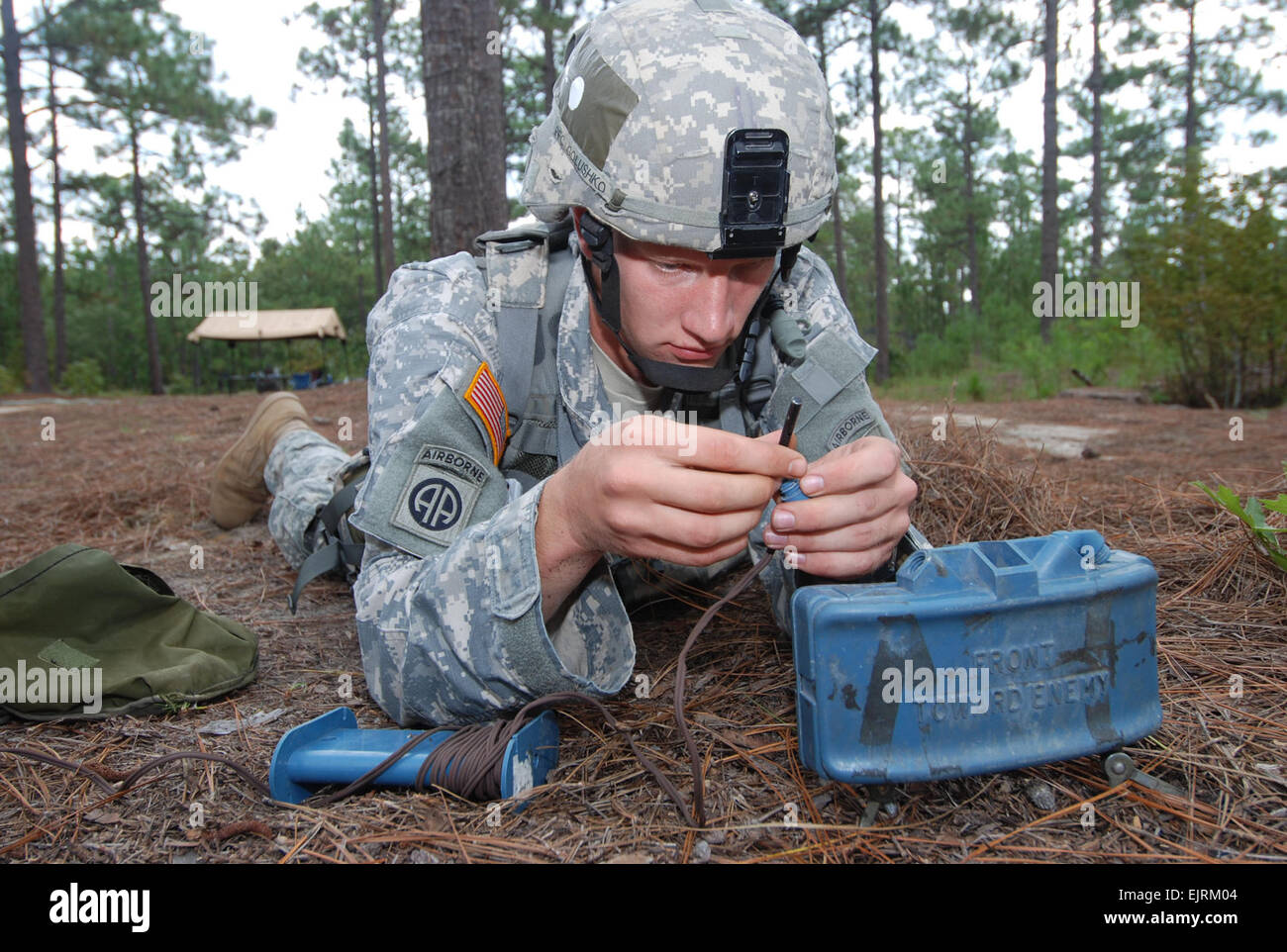 Spc. Gleb Golushko, of Company B, 2nd Battalion, 325th Airborne Infantry Regiment, 2nd Brigade Combat Team, 82nd Airborne Division, emplaces an M18A1 Claymore Mine during Expert Infantryman Badge training at Fort Bragg Sep. 15.   Staff Sgt. Mike Pryor, 2nd BCT, 82nd Abn. Div. Public Affairs Stock Photo