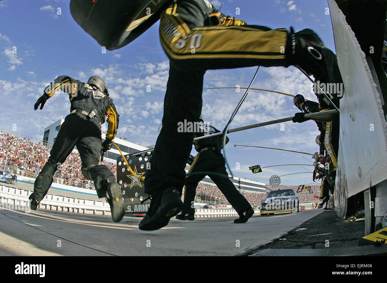 The pit crew team quickly service's the Army No. 8 Chevy at Dover International Speedway Sunday on its way to a fourth-place finish. Stock Photo