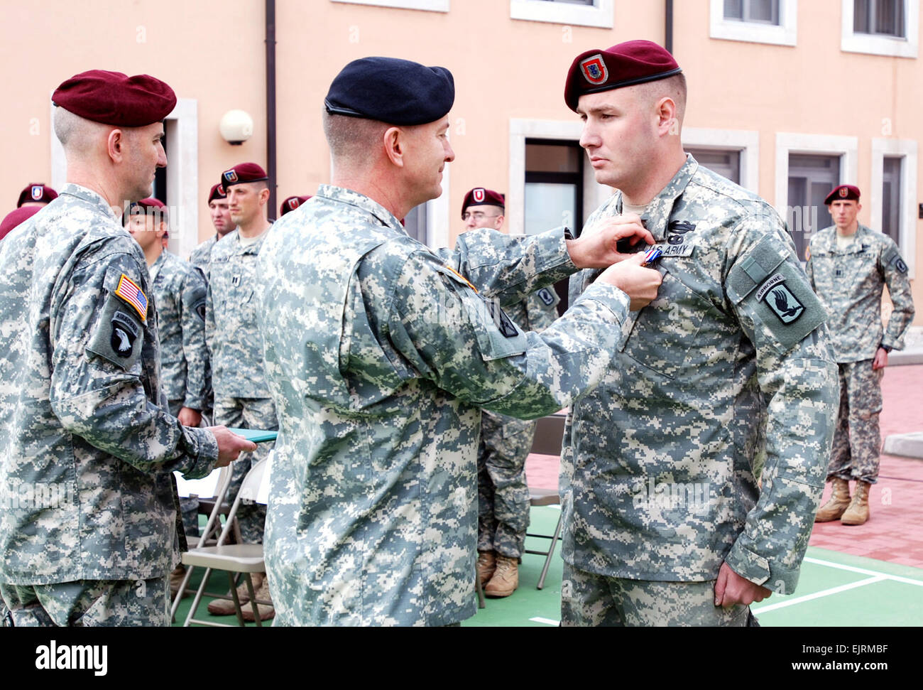 Brig. Gen. William, B. Garrett, Southern European Task Force commander,  presents Spc. Dillon Bergstad of Headquarters and Headquarters Company, 1st Battalion Airborne, 503rd Infantry Regiment with the Silver Star on Caserma Ederle in Vicenza, Italy, Oct. 31. Bergstad received the medal for his actions in combat while deployed to Afghanistan in August 2007.   Sgt. 1st Class Jacob Caldwell Stock Photo