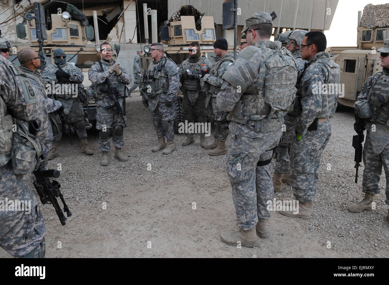 U.S. Soldiers of B Troop, 5th Cavalry, 73rd Regiment, 3rd Brigade Combat Team, 82nd Airborne Division, receive a convoy briefing on Forward Operating Base Loyalty, Beladiyat, eastern Baghdad, Iraq, on Jan. 2, 2009. Stock Photo