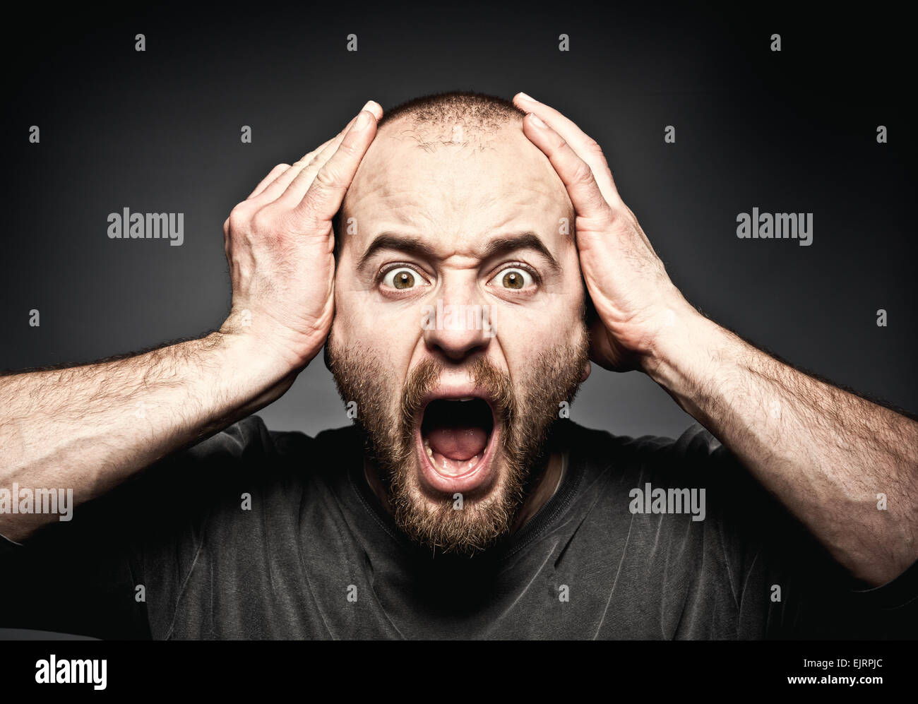 portrait of stressed man face Stock Photo