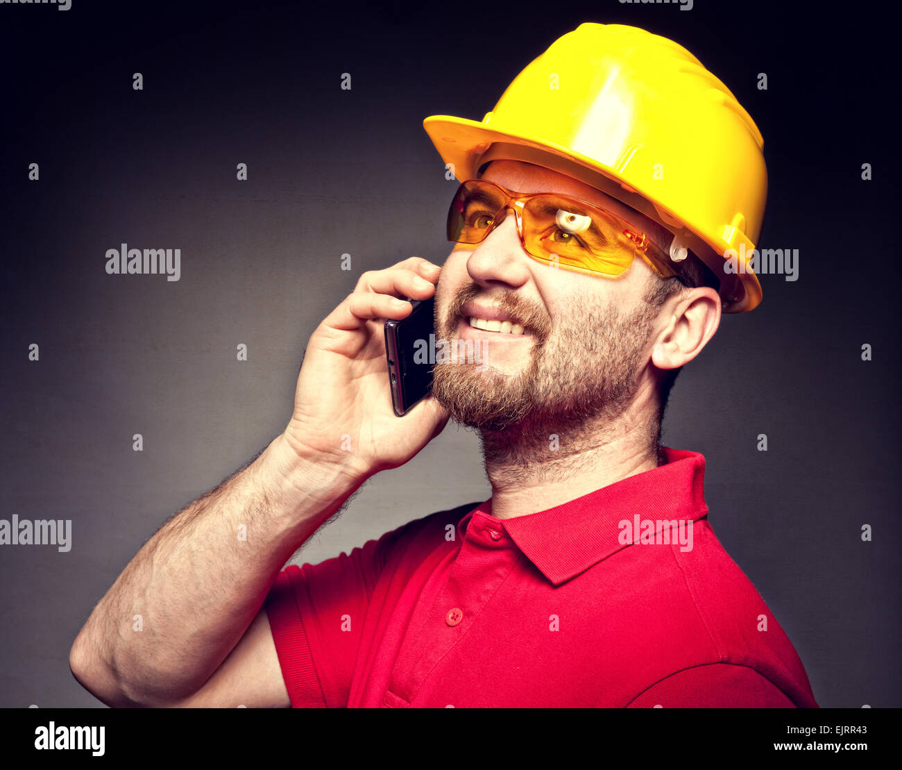 portrait of worker with mobile Stock Photo