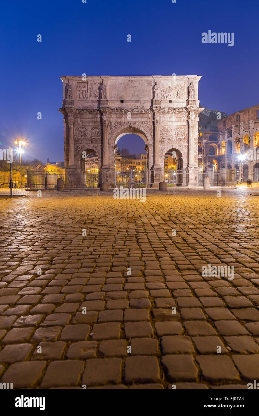 The Arch of Constantine near the Colosseum at night Stock Photo
