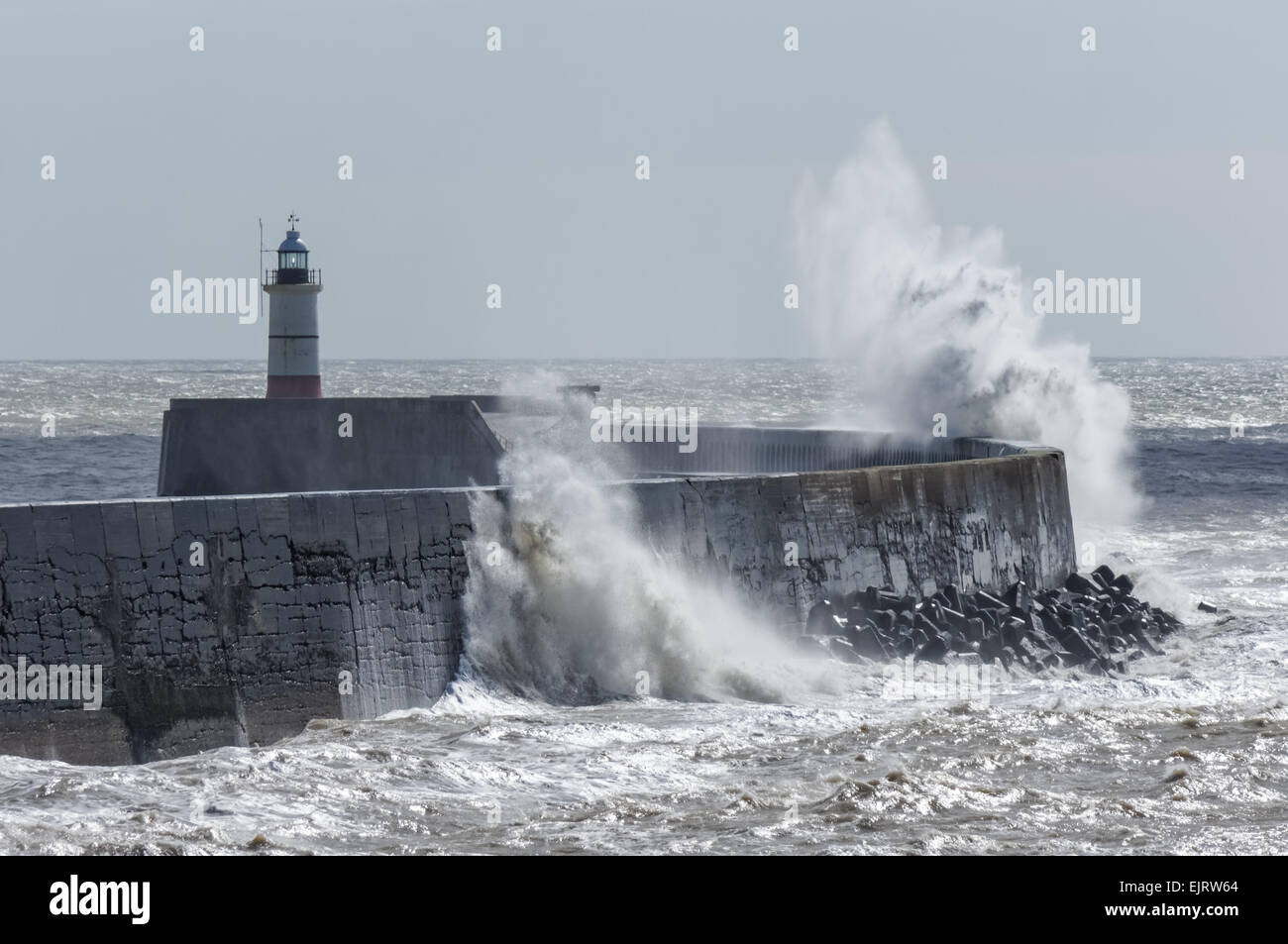Huge waves crash over the harbour wall at Newhaven, East Sussex United Kingdom UK Stock Photo