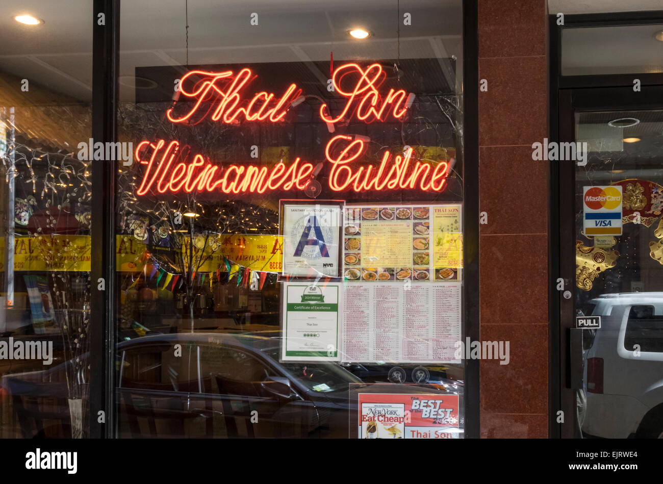 Neon sign in the window of a Vietnamese restaurant in Chinatown Stock Photo