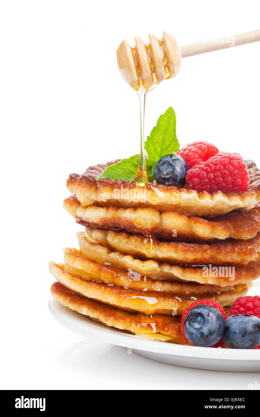 Pancakes Raspberry Blueberries Mint Pancakes with raspberry, blueberry, mint and honey syrup. Isolated on ...