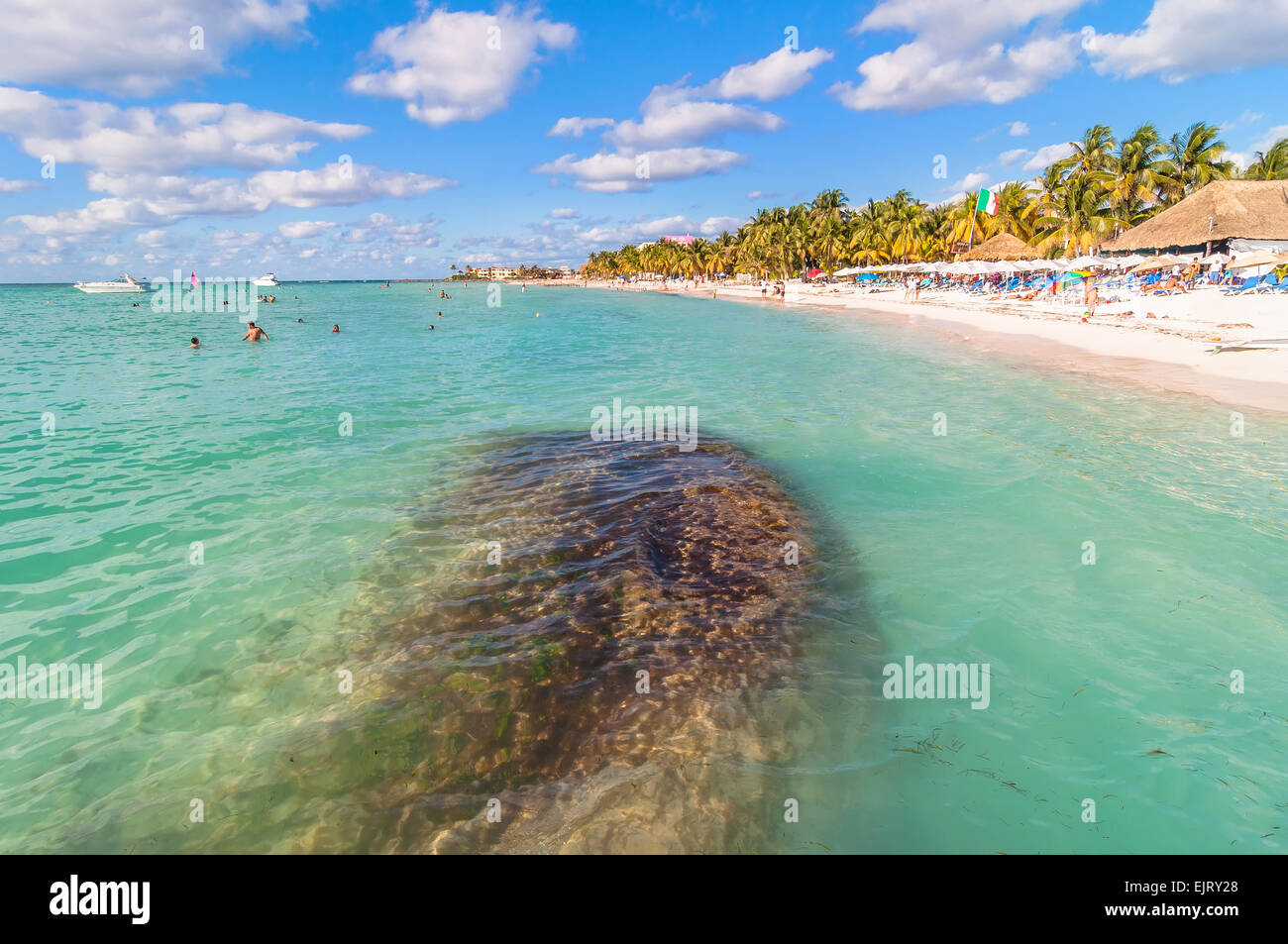Isla Mujeres, Mexico April 21, 2014 tourists enjoy tropical sea on