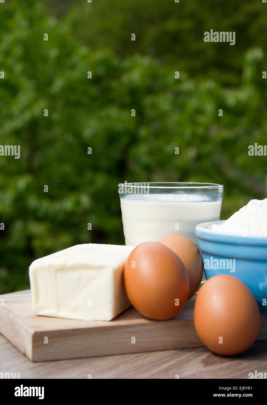Cake ingredients including milk eggs butter and flour Stock Photo Alamy
