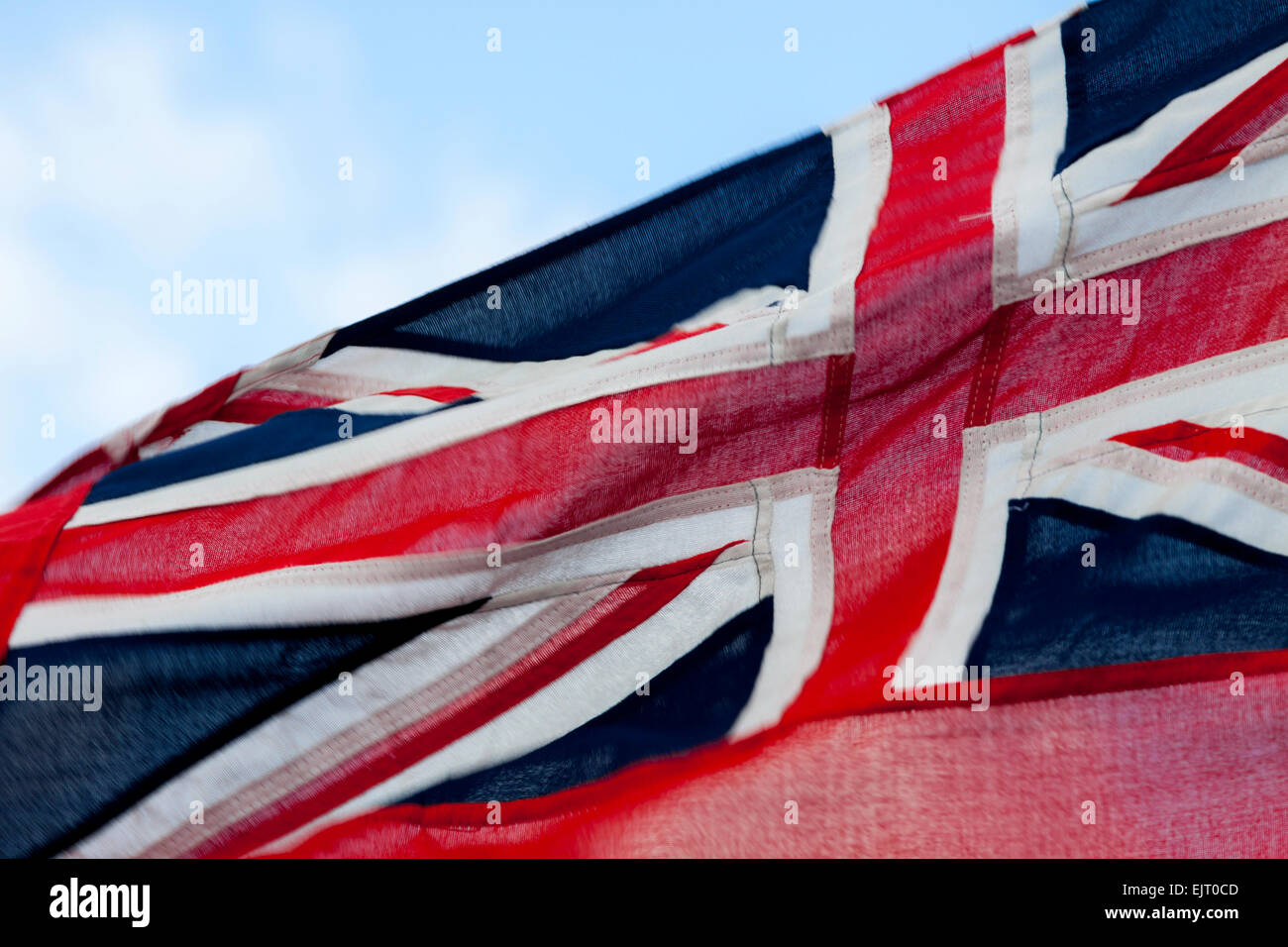 Close-up of Union Jack blowing in the wind on Plymouth Sound, Devon, England, Great Britain, United Kingdom. Stock Photo