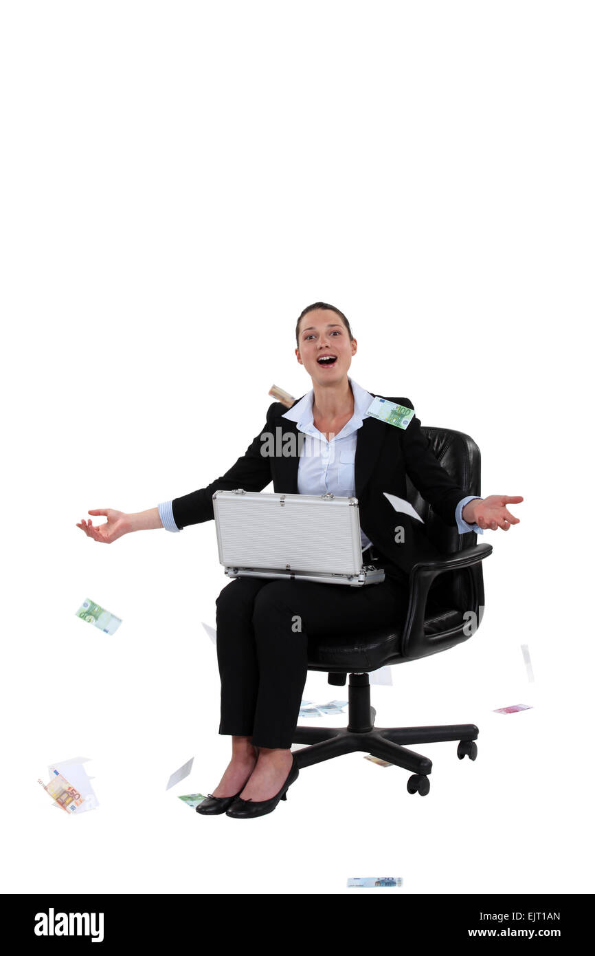 Overjoyed woman throwing money in the air Stock Photo Alamy