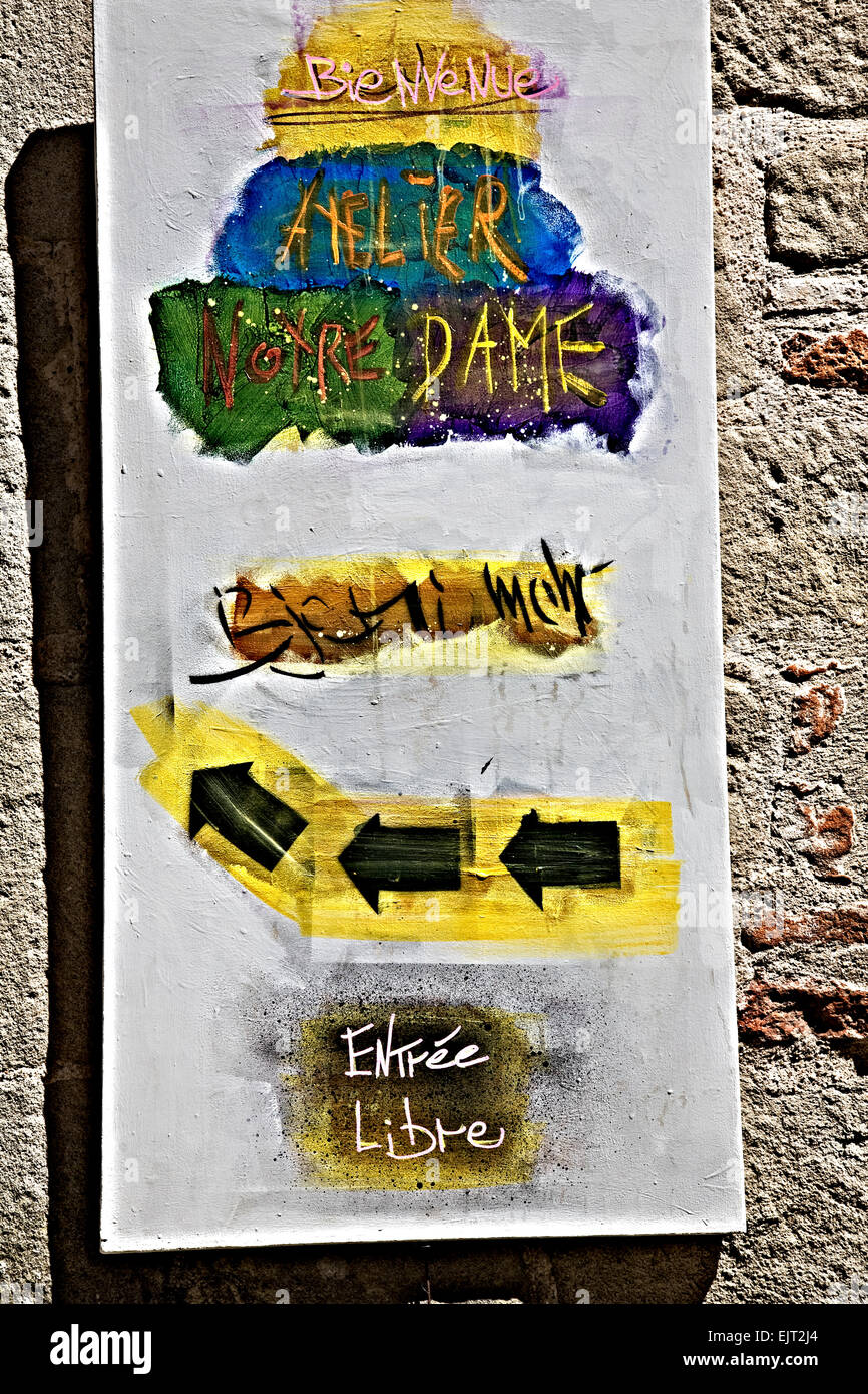 Artistic entrance sign to an art exhibition in a French village Stock