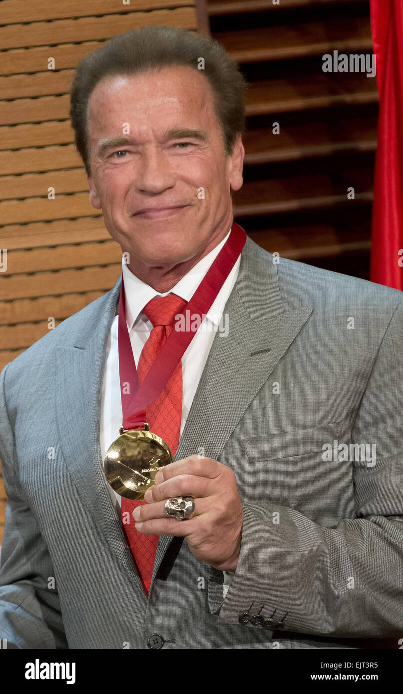 Arnold Schwarzenegger receives a medal honouring him as Tourism Ambassador for Madrid, for his contribution to the promotion of the city Featuring: Arnold Schwarzenegger Where: Madrid, Spain When: 26 Sep 2014 Stock Photo