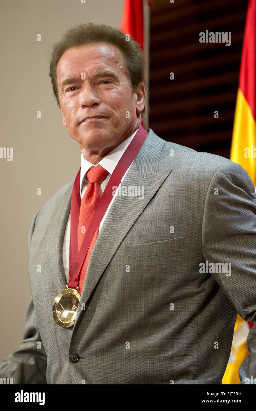 Arnold Schwarzenegger receives a medal honouring him as Tourism Ambassador for Madrid, for his contribution to the promotion of the city Featuring: Arnold Schwarzenegger Where: Madrid, Spain When: 26 Sep 2014 Stock Photo