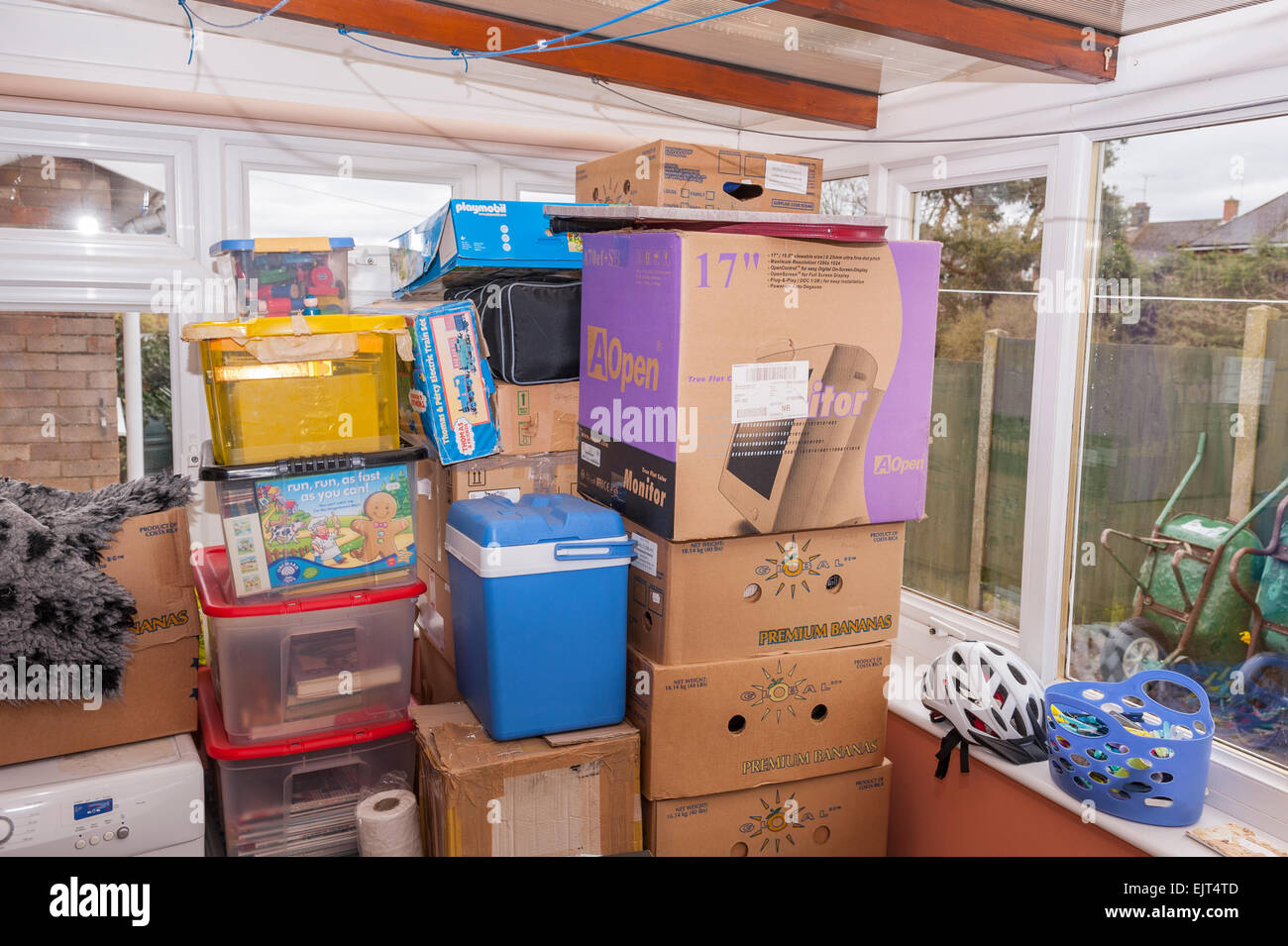 Boxes piled up ready for moving house Stock Photo Alamy
