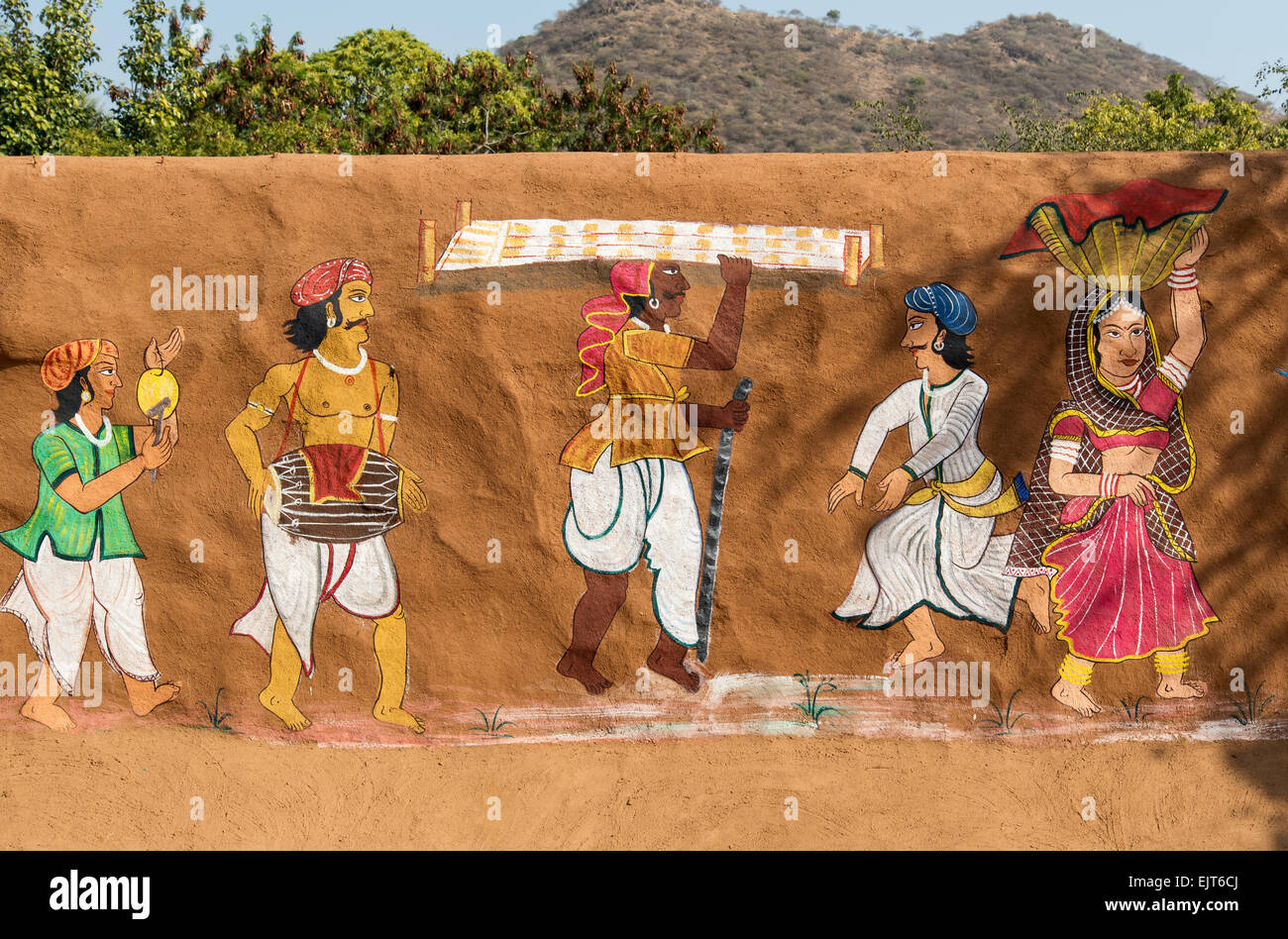 Traditional Painitng on Clay Wall in Rural Rajasthan, Shilpgram Crafts Village near Udaipur, India Stock Photo