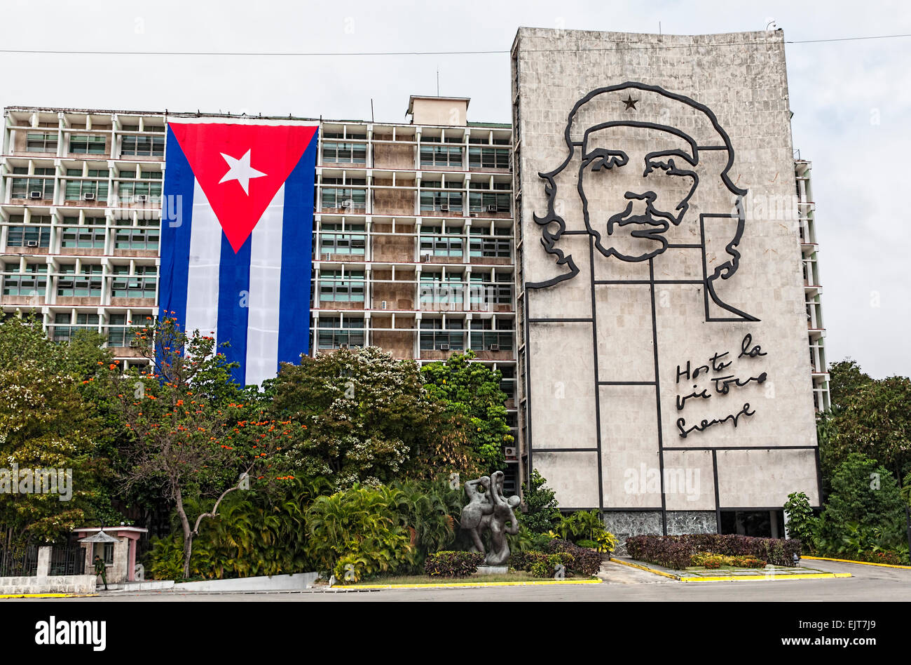 Government building in Revolution Square with Cuban flag and Che Guevara insignia Hasta La Victoria Siempre. Stock Photo