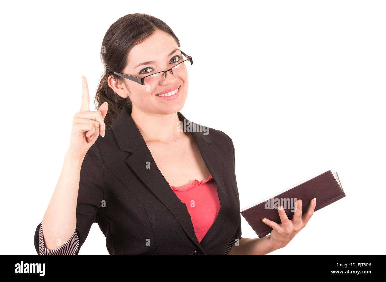 portrait of pretty female teacher wearing glasses and holding book ...