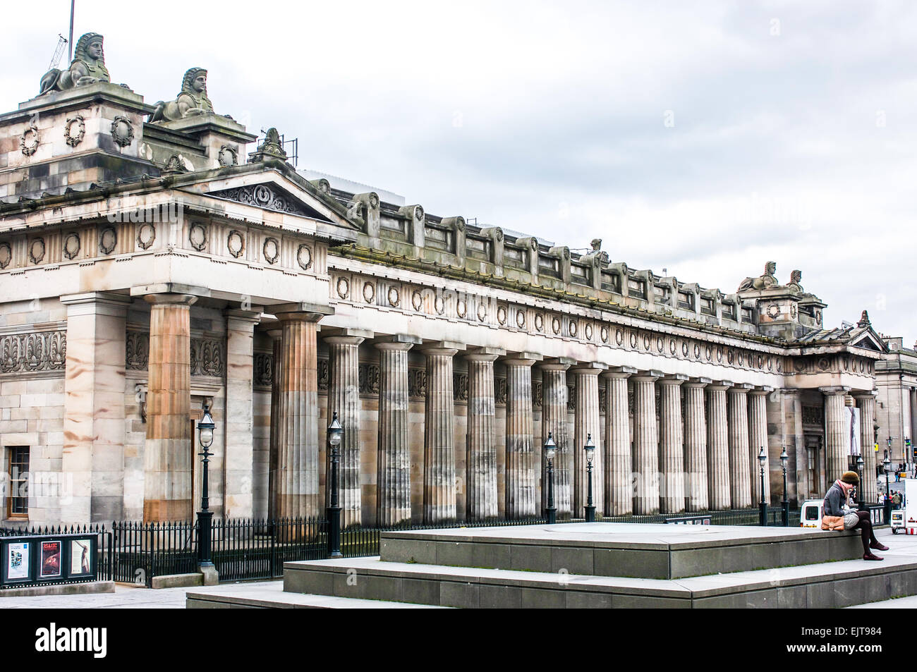 The classical columned facade of the National Gallery of Scotland in Edinburgh with sphinxes atop the roofline, Stock Photo