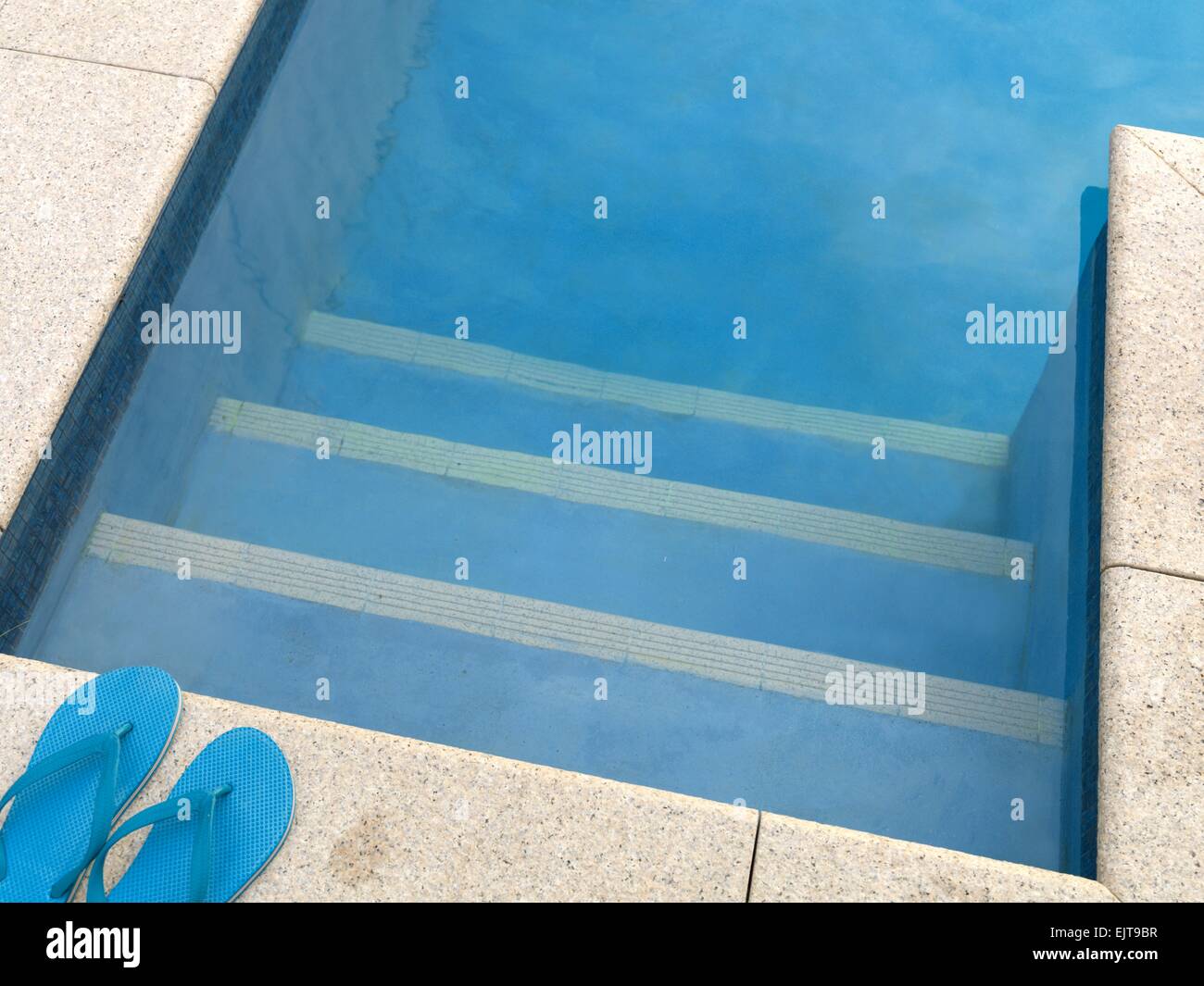 A close up shot of pool side items Stock Photo - Alamy