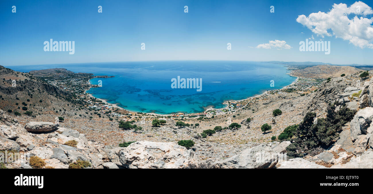 Panoramic landscape from the hills above the resort of Pefkos. Stock Photo