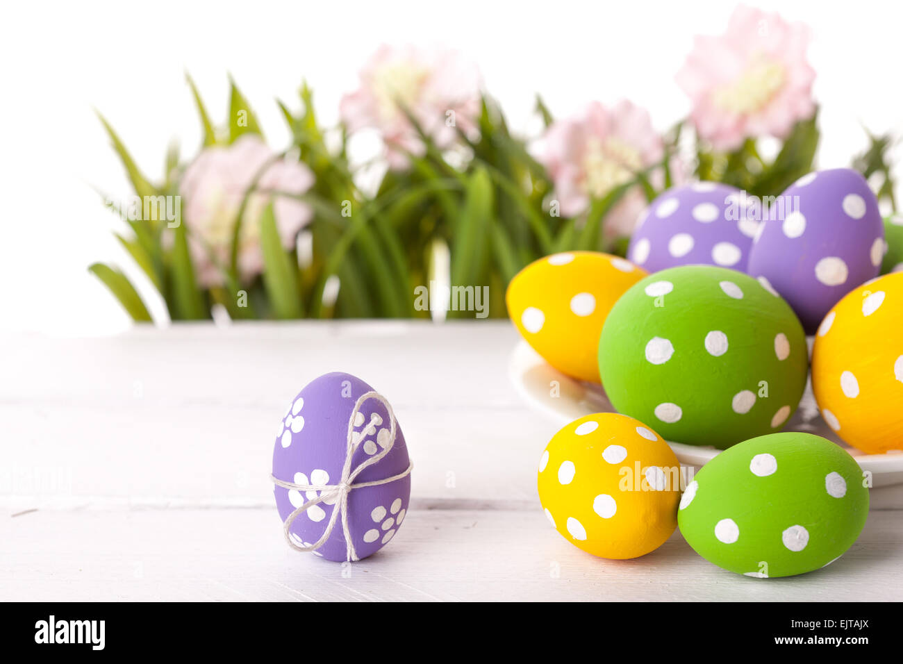 Easter Eggs with flower on Fresh Green Grass Stock Photo