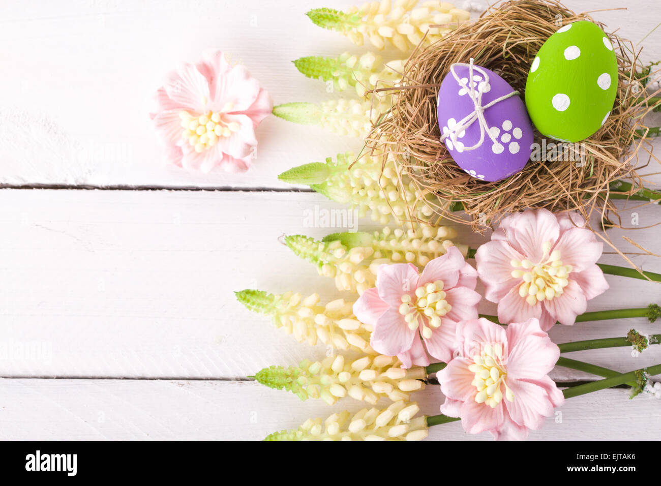 Easter eggs in a bird's nest Stock Photo - Alamy