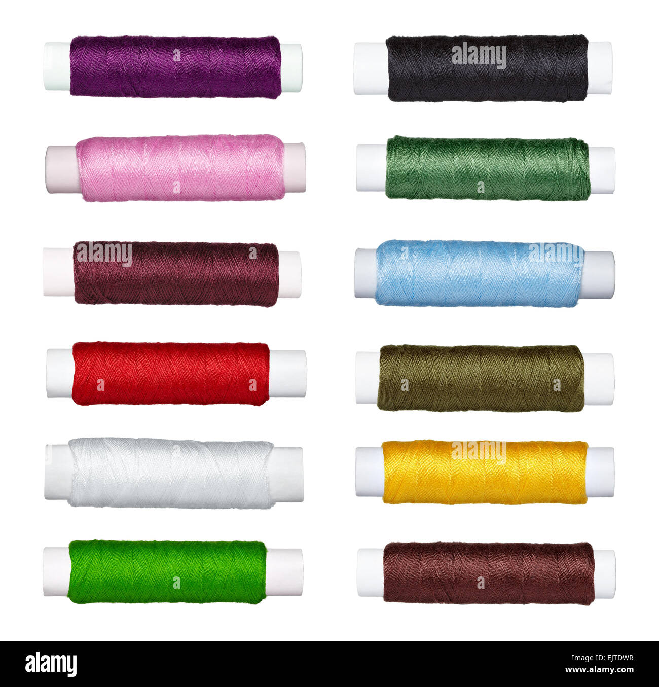 collection of various sewing threads on on white background. each one ...