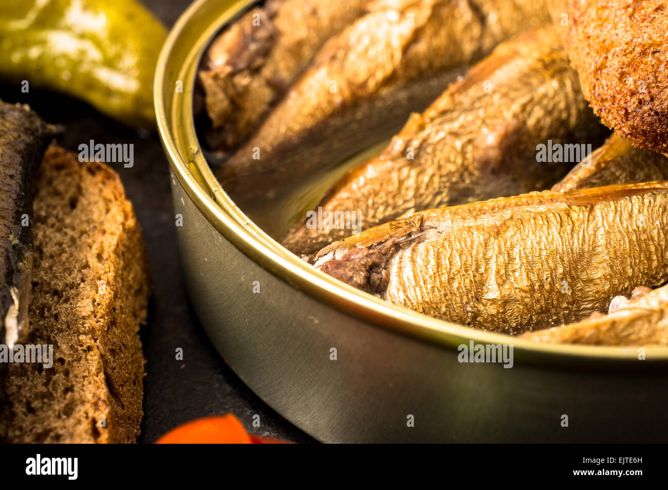 Large smoked sardines in a tin closeup Stock Photo Alamy